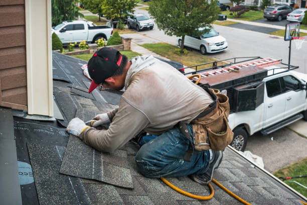 Professional Roofing technician working in Christine, ND